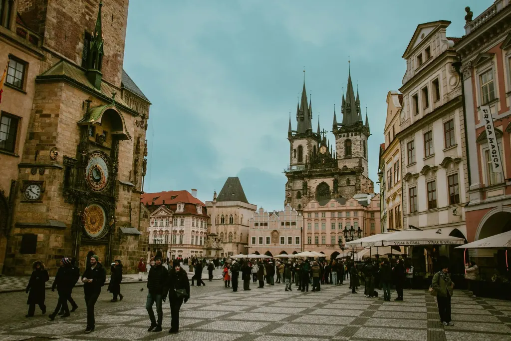 Travellers exploring a historic old town square
